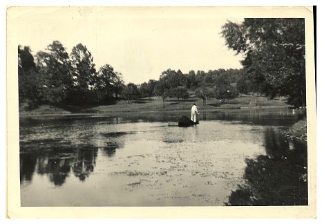 1940.. - Rob removing seaweed from the lake, a task that would go on for 30 years, often by moonlight.jpg